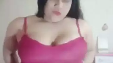 Big boob nude girl shows her butt and squeezes her boobs