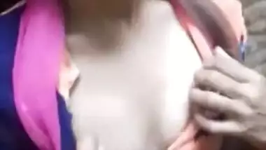 Adorable Desi cutie flashes curious friend her XXX tits in public